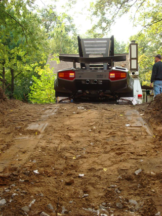 Illustration for article titled Countach Guy Needs Help: Basement-Built Lamborghini Fans Lead To Huge Web Hosting Bill